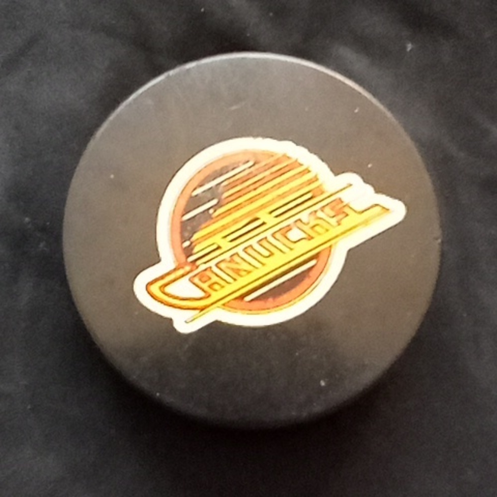 Vancouver Canucks game puck official
